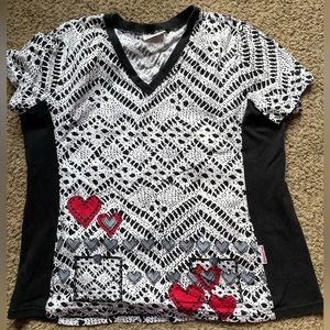 Scrub top. Fits like xl, size tag is no longer attached.